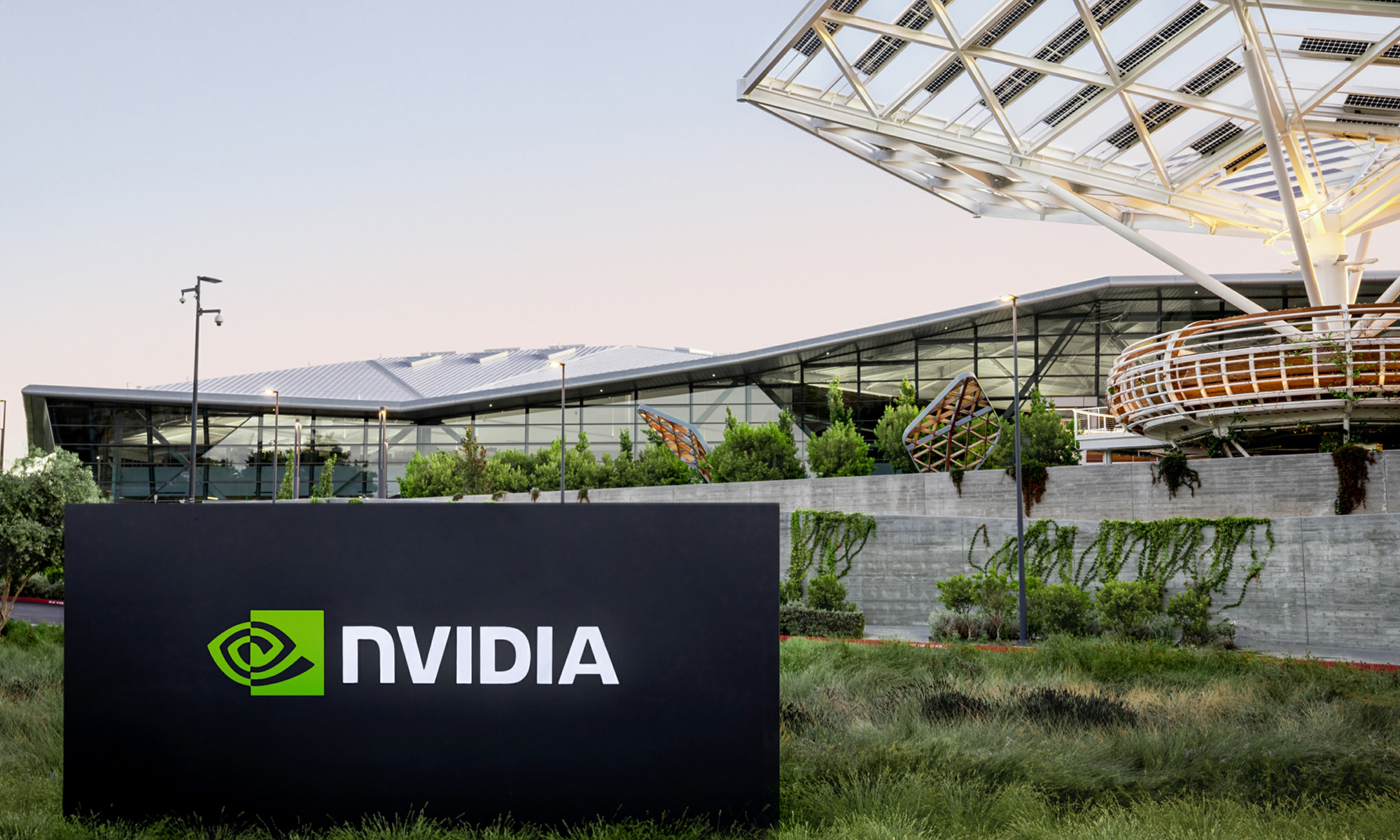 A sign displaying Nvidia's logo outside an office building.